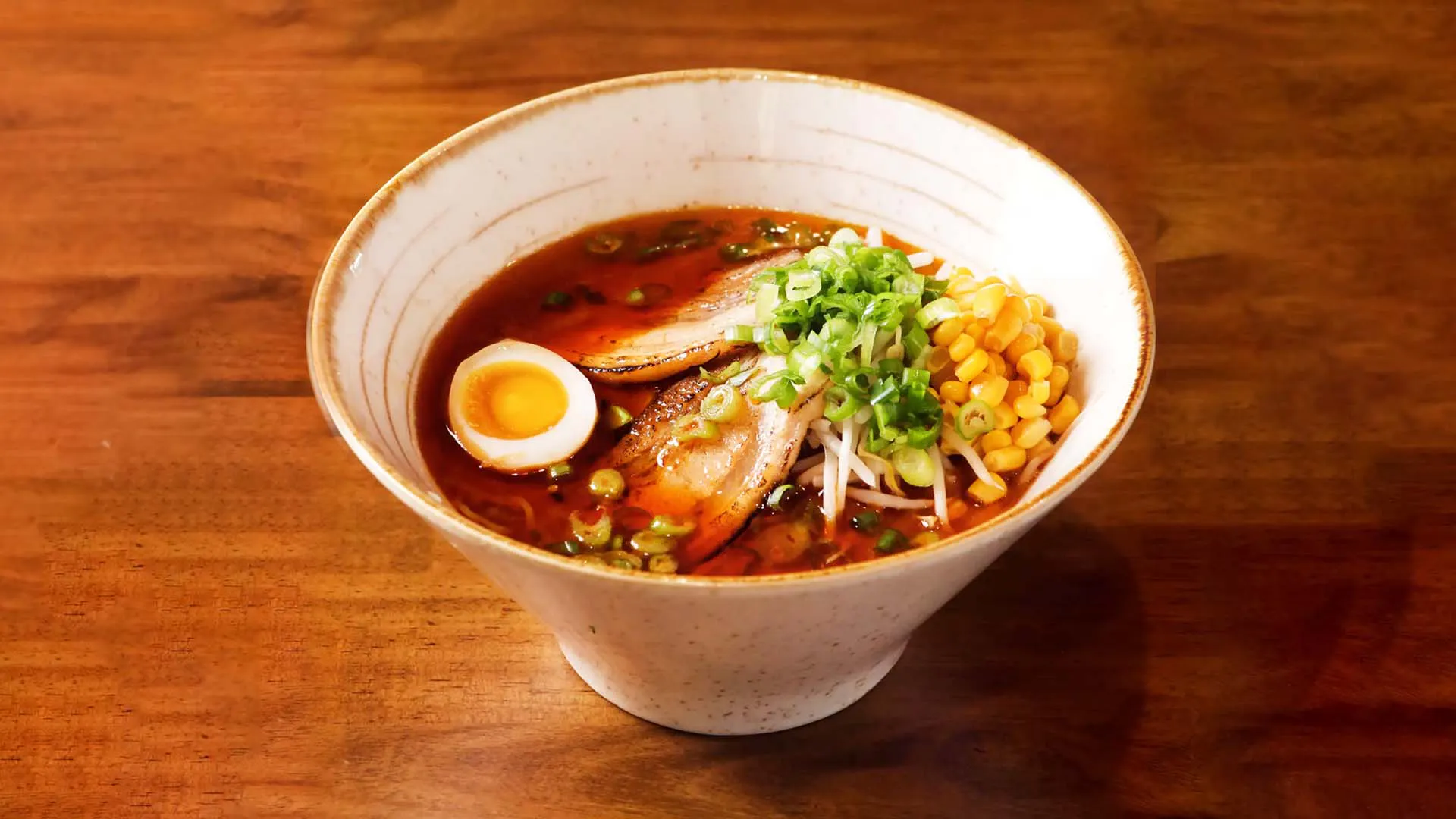 Spicy red broth ramen with chashu, corn and bean sprouts at Fujiya Ramen & Yakitori, a Asian Restaurant in Arcadia