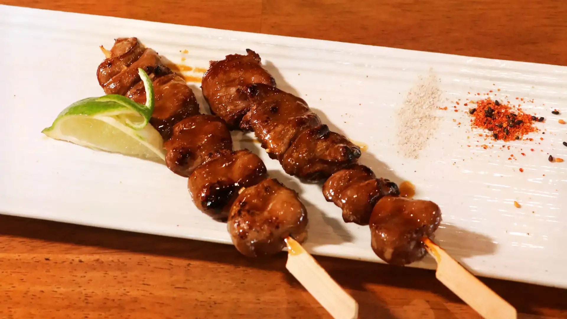 Teriyaki grilled chicken heart skewers with lime at Fujiya Ramen & Yakitori, a Asian Restaurant in Arcadia